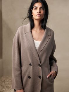 Enraptured by the soft and smooth blend of sumptuous cotton with LENZING� ECOVERO�, this roomy coatigan is expertly tailored to easily layer over more substantial pieces, like your favorite seasonal sweaters.  OVERSIZED FIT: Relaxed fit with a dr Chic Everyday Cashmere Outerwear, Winter Daywear Sweater Coat In Relaxed Fit, Winter Sweater Coat Relaxed Fit For Daywear, Relaxed Fit Sweater Coat For Winter Daywear, Oversized Classic Outerwear For Layering, Classic Oversized Outerwear For Layering, Oversized Cashmere Outerwear For Work, Oversized Long Sleeve Cashmere Outerwear, Relaxed Fit Sweater Coat For Workwear In Fall