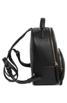 This cute and compact backpack is perfect for stashing your essentials, leaving you handsfree. - Single top handle- Dual adjustable shoulder straps - Zip around top closure - Exterior features leather construction, front zip around pocket- Interior features wall zip and slip pockets- Approx. 9.5” H x 8.75” W x 5” D- Approx. 2” drop- Imported Model's height for scale: 5'9" Leather exterior, 50% recycled polyester, 50% polyester lining Crossbody Backpack With Adjustable Strap In Faux Leather, Crossbody Faux Leather Backpack With Adjustable Strap, Faux Leather Crossbody Backpack With Adjustable Strap, Adjustable Backpack With Zipper For Everyday Use, Adjustable Faux Leather Bag For Everyday Use, Faux Leather Backpack With Adjustable Strap, Adjustable Backpack With Zipper Closure For Daily Use, Adjustable Standard Backpack With Zipper Closure, Faux Leather Backpack With Detachable Strap