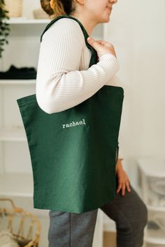 Our Essential custom name embroidered tote bag is made to order and personalized with your name on it! This tote bag is the perfect size to carry all of your daily essentials, making it perfect as a casual everyday bag or a reusable grocery tote. Perfect for yourself, mom, bridesmaids, teachers, Christmas or Bday gift! DETAILS - 100% cotton - Natural (15 1/2 in x 16 in) - Black (16 1/2 in x17 1/2 in) - Machine Embroidered HOW TO ORDER 1) From the dropdown menu, choose your tote bag color 2) In t Customizable Green Bags For Personalized Gifts, Personalized Green Bags For Daily Use, Customizable Green Bags For Daily Use, Everyday Green Embroidered Bag, Green Cotton Bags With Embroidery, Embroidered Green Cotton Bags, Green Embroidered Cotton Bags, Embroidered Cotton Bags For Gifts, Eco-friendly Embroidered Canvas Bag As Gift