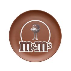 a brown plate with the words m & m's and an image of a cat on it