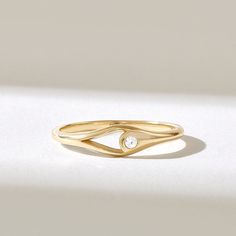 The Diamond Open Bezel Pinky Ring is a remarkable piece of jewelry that effortlessly combines modern minimalism with timeless elegance. Crafted from your choice of 14k, 18k, or 10k solid gold, this statement ring is designed to adorn your pinky finger, making it a subtle yet stylish addition to your everyday look. Features * Made to Order. * Gold KT: 10K, 14K, 18K * Width of Band: 1.56MM * Width of Top: 4.61MM * Thickness of Band: 1.17MM * Custom Gold Color: Rose Gold, Yellow Gold, White Gold * Diamond Color- Clarity: D-E-F color VVS clarity (excellent ideal cut) *Total Ctw: 0.06 ctw * Ready to Ship in 5-7 Business Days ✓ We care about the environment,the jewelry we cast is made with recycled gold. We source exclusively post-consumer material that is refined back to their pure elements to Minimalist Diamond Ring With Si Clarity, Everyday Yellow Gold Diamond Ring With Si Clarity, Everyday Yellow Gold Diamond Ring Si Clarity, Gold Diamond Ring With Si Clarity In Minimalist Style, 14k Gold Diamond Ring With Si Clarity, Modern Style, Modern 14k Gold Diamond Ring With Si Clarity, Modern Yellow Gold Diamond Ring With Si Clarity, Modern Yellow Gold Diamond Ring Si Clarity, Modern Stackable Rings With Single Diamond