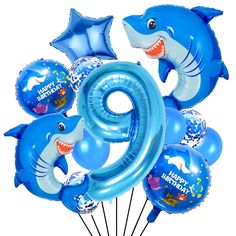 a bunch of balloons that are shaped like animals and the number six is surrounded by dolphins