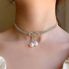 This Unique Piece Is A Wonderful Addition To Your Wonderful Addition To Your Wardrobe And Your Style; Sure To Get Lots Of Compliments! Gsunmw50400jml0 Gsunn350000hj3y Gsumpk50c00jn3m White Crystal Rhinestone Jeweled Necklace, White Rhinestone Choker Jewelry, Party Rhinestone Necklace With Clavicle Chain In Diamond White, White Rhinestone Clavicle Chain Necklace For Party, White Pearl Rhinestone Necklace With Clavicle Chain, White Rhinestone Choker For Parties, White Crystal Rhinestone Necklace For Evening, White Rhinestone Clavicle Necklace For Party, Elegant Jeweled Metal Choker