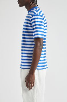 Classic stripes race across this staple cotton T-shirt that can be layered and worn year-round. 26" length (size Medium) Crewneck Short sleeves 100% cotton Machine wash, dry flat Made in Portugal Designer Clothing Blue Cotton T-shirt With Contrast Stripes, Summer Cotton Crew Neck T-shirt, Summer Crew Neck T-shirt With Three Stripes, White Horizontal Stripe T-shirt For Summer, White Horizontal Stripe Cotton T-shirt, White T-shirt With Horizontal Stripes For Summer, White Cotton T-shirt With Horizontal Stripes, Relaxed Fit Crew Neck Top With Signature Stripes, Blue Cotton T-shirt With Three Stripes