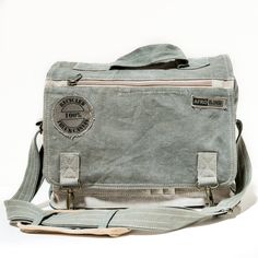 This Messenger Bag is  made of original truck and military canvas. - heavy duty cotton - all weather resistant - unique in detailing and shade of canvas - light and durable    Features   - 1 large zippered interior compartment - cotton lining with key/phone zip pocket - small outer pockets for phone, pencils etc. - 1 big zippered outer pocket - 1 flap zip pocket - adjustable strap with shoulder pad Measurements: 39x26x11cm   Every piece of canvas is original, giving each bag a unique design. Canvas Messenger Bag, Bags Aesthetic, Canvas Shoulder Bag, Cute Bags, Fun Bags, Casual Bags, Shoulder Pads, Bag Sale, Purses And Handbags