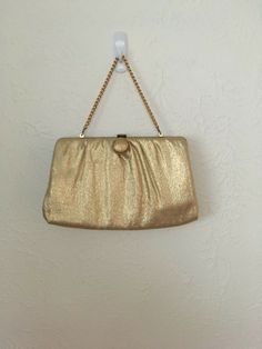 Welcome to South of the River Antiques Up for Sale: One Vintage 1960s Gold Lame Convertible Evening Bag. Overall purse is in very good condition, minor wear and very clean. Interior has one small hole, a few tag holes, and mark across one corner. Exterior has no stains or holes, metal has minor wear. Measures approx 9.5'' by 5.5'' by 1''. Please ask if you have any questions, comes from a smoke free home. THANKS FOR LOOKING, please email us if you have any questions or would like to request addi Gold Lame, Gold Bag, Evening Handbag, Bag Vintage, Vintage 60s, Handbag Purse, Vintage 1960s, Chain Strap, Vintage Gold