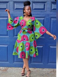 You have in your view a simple but stylish women's African clothing made from the choicest  African print fabric. The fabric is soft and comfortable on the skin and the material is styled with love. This dress is hand styled and handmade combining the modern with the traditional. The brightness and pop of colors in the wax print makes this dress unique. It is the best dress you need for your special occasions and events.  Wear this dress for weddings, parties, church, Ghana wedding, Nigeria engagement, traditional marriage ceremony, bridesmaids party, etc. Send us a conversation for custom sizes and fabrics. Trendy Multicolor A-line Dress, Chic Green Midi Dress With Vibrant Print, Trendy Colorful Pattern Dress For Vacation, Fitted V-neck Dress In Multicolor Print, Trendy Colorful Patterned Dress For Vacation, Fitted Multicolor Print V-neck Mini Dress, Green Summer Dress With Abstract Print, Summer Green Dress With Abstract Print, Green Abstract Print Summer Dress