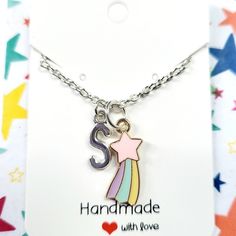 These rainbow shooting star charm necklaces and matching earrings make the perfect gift for birthday present, or a best friend, BFF, for girls.  These childrens jewellery can be personalised and you can add an initial to the necklace. Please choose the letter from the drop down menu.  These kids earrings and necklaces are made with enamel zinc alloy, zinc alloy letters and silver plated 16 inch chain.  The letters are 16x6mm small. You can message the seller if you want an 14 inch or 18 inch cha Childrens Necklace, Personalised Necklace, Necklace Star, Star Charm Necklace, Friend Bff, Rainbow Necklace, Necklace Initial, Kids Earrings, Charm Necklaces