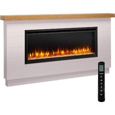 an electric fireplace with the remote control on it's side and flames in front