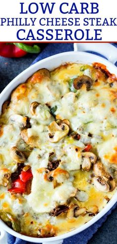 a casserole dish with cheese, mushrooms and peppers in it on a blue cloth