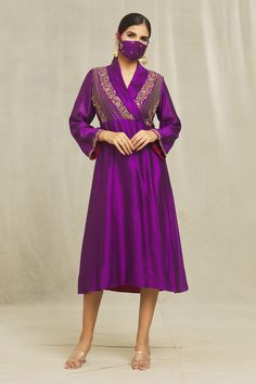 Purple dress kurta in organic silk base with bells sleeves, shawl collar, floral motifs, zardozi, sequins, beads, cutdana, kasab, resham and cotton thread hand embroidery. Comes with a matching mask.
Components: 2
Pattern: Hand Embroidered
Type Of Work: Floral
Neckline: Shawl Collar
Sleeve Type: Bell
Fabric: Organic silk
Color: Purple
Occasion: Mehendi and Haldi - Aza Fashions Eid V-neck Kurta With Intricate Embroidery, Festive Semi-stitched Silk Embroidered Dress, Elegant V-neck Kurta For Festive Occasions, Traditional Long Sleeve Embroidered Dress For Reception, Elegant V-neck Anarkali Set With Resham Embroidery, Bollywood Style Embroidered Dress For Diwali Reception, Bollywood Embroidered Dress For Diwali Reception, Elegant Embroidered Dress For Diwali Reception, Festive V-neck Dress With Resham Embroidery