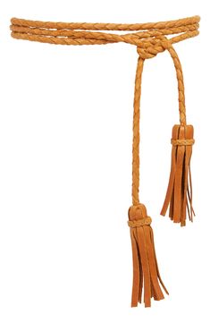 Tassel-accented ties and a braided strap lend Western appeal to this handmade belt that complements both casual and fancier looks. 1/4" width Leather Handmade in Argentina Adjustable Woven Leather Belt, Cognac Belt, Leather Wrap Belt, Handmade Belt, Tassel Belt, Rope Belt, Handmade Belts, Wrap Belt, Perfume Gift Sets