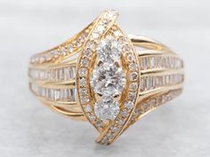 This stunning diamond ring is crafted with lustrous yellow gold and twinkling diamonds. The bypass design adds a unique touch to this classic piece, while the diamond accents provide an extra touch of elegance. Perfect for adding a touch of sparkle to any outfit. Metal: 14K Yellow Gold Gem: Diamonds totaling 1.31 Carats, I in Clarity, G-I in Color Gem Measurements: 4.2 mm, Round Ring Size: 6.50 Marks: "14K" Stamped on the inside band SKU #: A42969 Each piece has been identified and graded by a Graduate Gemologist who has been certified by the Gemological Institute of America (GIA). We have six brick-and-mortar storefronts in Maine, Massachusetts, and New Hampshire and have been in business for over 25 years! Please visit our Shop's About Page or our website for more information about our j Engagement Ring Wraps, Stunning Diamond Rings, Right Hand Ring, Gem Diamonds, Bypass Ring, Pocket Watch Chain, Right Hand Rings, Hand Ring, Colored Gems