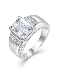 a white gold ring with a princess cut diamond in the center and side stones on each band