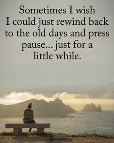 a person sitting on top of a bench next to the ocean with a quote above it