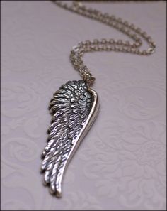 ♥Angel Wing Necklace~Silver Wing Jewelry~Jewelry of Faith, BEST SELLER, Mother, Sister, Friend Perfect Gift, Gorgeous Design Angel WIng ♥ One of my BEST SELLING NECKLACES, Great Gift for all. Simple yet so meaningful. This beautiful necklace features a large detailed angel wing pendant. The wing pendant has an oxidized finish which gives it added dimension. The details really stand out on this necklace. It has an antiqued vintage look to it. Perfect for layering or wearing alone as a statement p Silver Engraved Wing-shaped Jewelry, Metal Wing-shaped Jewelry Gift, Engraved Wing-shaped Silver Jewelry, Engraved Wing-shaped Jewelry For Gifts, Engraved Wing-shaped Jewelry Gift, Silver Wing-shaped Sterling Silver Necklace, Personalized Silver Wing-shaped Necklace, Love Wife, Wing Jewelry