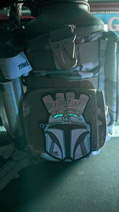 a back pack with star wars stickers on it