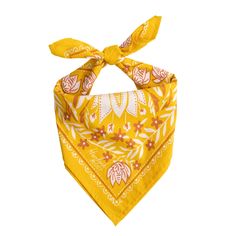 a yellow bandana with an orange and white design