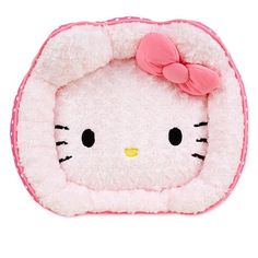 a hello kitty stuffed animal with a pink bow on it's head and eyes