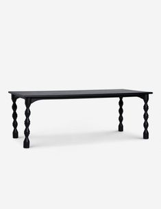 a black table with wooden legs on a white background