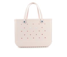 a pink handbag with polka dots on it