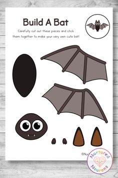 the paper cut out of a bat with eyes, nose and mouth for halloween crafts