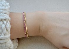 This tiny pink tourmaline beaded bracelet with gold plated hematite beads is a perfect bridesmaid gift or Christmas present for Her. These dainty minimalist beaded 2mm gemstone bracelets look amazing together. . ❗️Sign up to our Newsletter and get 15% OFF your order (copy this link to browser search) - https://forms.gle/R74xLdL1MSmC9Apn6 ❗️ . If you need to buy two bracelets with different length feel free to write me a message, all bracelets are made to order so I can personalize everything you Dainty Yellow Gold Beaded Bracelets In 14k Gold Filled, Tiny Beads Bracelet Jewelry Gift, Adjustable 14k Gold Beaded Bracelets With Tiny Beads, Delicate Adjustable Beaded Bracelets For Bridesmaids, Adjustable Delicate Beaded Bracelets For Bridesmaids, Handmade 14k Gold-filled Beaded Bracelets As Gift, Delicate Adjustable 14k Gold Beaded Bracelet, Adjustable Delicate 14k Gold Beaded Bracelet, Dainty Adjustable Gold-plated Beaded Bracelets