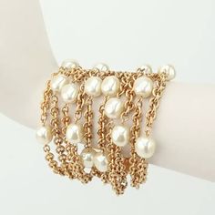 Vintage 80's Carolee Multi Strand Gold Chain & Faux Pearl Bracelet This 1980's Chunky Gold Tone Multi Chain Bracelet Is Adorned With Her Trademark Large Faux Pearls. A Stylish Statement Piece With A Nod To Chanel Designs. Condition: Very Good/Excellent Ten Chain Links With Pearls Bar Slide Clasp With Quilted Pattern That Securely Closes For A The Perfect Fit Hallmarked Carolee Stamp On The Back Side Of Clasp Approximate Measurements: 7.25" End To End, 1.75" Wide At The Clasp, 2.5" Wide Center Of Bracelet Measures Approximately 6.5" Circumference At Inside When Closed. Multi Chain Bracelet, Armband Gold, Faux Pearl Bracelet, Quilted Pattern, Chain Links, Multi Strand, Pearl Bracelet, Link Bracelets, Womens Jewelry Bracelets