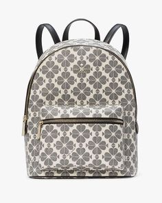 Signature Spade Flower Backpack | Kate Spade Outlet Travel Backpack With Removable Pouch In Coated Canvas, Coated Canvas Backpack With Zipper Closure For On-the-go, On-the-go Coated Canvas Leather Backpack, White Commuter Backpack, White Commuting Backpack, Kate Spade Nylon Standard Backpack, Kate Spade Nylon Backpack For School, Kate Spade Nylon Backpack For Everyday Use, Kate Spade Everyday Nylon Backpack