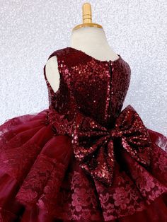 A modern country-inspired dress with cascading ruffle tiers carefully hand stitched to perfection for any upscale event or birthday! The burgundy sequin sleeveless bodice is fully lined for the ultimate comfort. Beautiful embroidery can be found across the waistline for added detail. The dress comes with a detachable sequence bow. Zipper can be found on the back of the dress. The skirt is made out of multiple rows of tulle ruffles with lace hem with four layers of tulle used on each row for a un Birthday Party Photoshoot, Gold Sequence Dress, Toddler Pageant, Christmas Pictures Outfits, Quinceanera Dresses Gold, Birthday Party Props, Tulle Ruffles, Blush Gown, 2piece Outfits