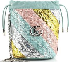 Looking for a sparkling addition to your bag collection? Check out our Pre-Owned Gucci GG Marmont Diagonal Quilted Sequins Mini Bucket Bag! Bucket Bag Silhouette: With its unique shape and drawstring closure, this bag is perfect for those who want to stand out. Multicolor: The colorful sequins make this bag a statement piece that will complement any outfit. Fits Essentials: Don't be fooled by its mini size - this bag can fit your iPhone Pro Max/Plus, Airpods, small wallet, and even lipstick! Fab Diagonal Quilt, Green Gucci, Gucci Gg Marmont Mini, Mini Bucket Bag, Mini Bucket Bags, Mini Bucket, Gucci Gg Marmont, Gg Marmont, Saint Pierre And Miquelon