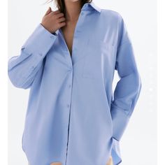 Oversized Fit Brand New With Tag Size Small Oversized Light Blue Shirt With Pockets, Oversized Light Blue Shirt For Work, Oversized Blue Shirt For The Office, Oversized Light Blue Collared Shirt, Oversized Blue Button-up Shirt, Blue Oversized Long Sleeve Blouse, Oversized Blue Long Sleeve Blouse, Chic Oversized Blue Blouse, Oversized Blue Shirt For Work