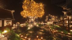 a large tree is lit up at night in the middle of a city with lots of lights