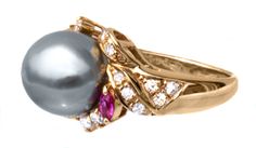 This is a beautiful, large 11 mm Tahitian Platinum Pearl, Diamond & Ruby ring from our vintage collection. It would be a stunning addition to your jewelry wardrobe. The setting is almost a 'bypass' setting design, with 2 lovely natural rubies and diamonds accenting the pearl, all in 18K yellow gold. A question we're asked often - Does it in person look like the photographs? Yes! Even better - we photograph in sunlight, but the sparkle is truly impossible to catch on camera. Setting: 18K soli Tahitian Pearl Jewelry With Diamond Accents For Wedding, Luxury Tahitian Pearl Anniversary Jewelry, Luxury Tahitian Pearl Jewelry For Anniversary, Elegant Multi-stone Gold Pearl Ring, Luxury Tahitian Pearl Jewelry With Brilliant Cut, Elegant Yellow Gold Multi-stone Pearl Ring, Elegant Formal Multi-stone Pearl Ring, Elegant Yellow Gold Tahitian Pearl Rings, Luxury Tahitian Pearl Ring For Formal Occasions