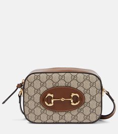 Gucci Horsebit 1955 Small canvas crossbody bag in brown - Gucci | Mytheresa Leather Crossbody Bag Small, Gucci Horsebit, Canvas Crossbody Bag, Balenciaga Bag, Signature Hardware, Small Canvas, Jimmy Choo Shoes, Womens Crossbody Bag, Small Crossbody Bag