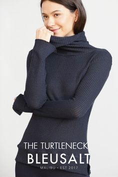 This seasonless basic, worn on its own or as a layering piece, perfectly moves with you through the seasons. Fitted Fine Knit Turtleneck, Fitted Fine Knit High Neck Turtleneck, Fitted Fine Knit Turtleneck For Layering, High Neck Turtleneck With Thumbholes For Layering, Turtleneck With Thumbholes For Layering, Chic Fitted Turtleneck With Thumbholes, Classic Fitted Funnel Neck Turtleneck, Classic Fitted Turtleneck With Funnel Neck, Winter Mock Neck Top With Thumbholes