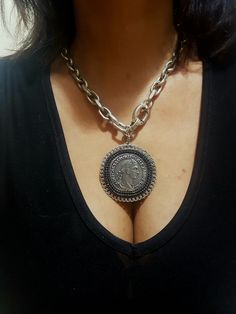 "♦ A silver link chain necklace, made of silver-plated brass with a black zircon, The necklace is designed in a chic style decorated with Largth coin pendant. SIZE: length 15.8\"(40cm) up to 19.9\"(50 cm) width coins 1.96\" (6 cm) width chain: 0.39\" (1cm) ♦ This piece of jewelry is perfect as a gift for yourself, for a wedding day, Valentine's Day, beach, Festival or a birthday. If you're interested in sending a gift to a third party, just write your message to the recipient and I will do so wi Elegant Silver Coin Necklace With Adjustable Chain, Elegant Silver Round Pendant Coin Necklace, Silver Coin-shaped Metal Necklaces, Silver Chain Medallion Jewelry, Elegant Coin Medallion Necklace With Adjustable Chain, Elegant Coin-shaped Medallion Necklace With Adjustable Chain, Elegant Silver Chain Necklace With Coin Pendant, Nickel-free Silver Coin Pendant Necklace, Elegant Silver Coin Necklace With Chain