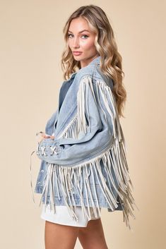 Introducing our Buckle Up Fringed Denim Jacket! Elevate your denim game with this edgy and stylish piece. Featuring fringe details and buckle accents, this jacket adds a touch of flair to any outfit. Edgy and stylish denim jacket with fringe details and buckle accents Versatile piece that can be dressed up or down for any occasion Made from high-quality denim for durability and comfort Perfect for adding a touch of flair to your everyday look Casual Fringe Denim Jacket For Spring, Casual Medium Wash Outerwear With Fringe, Trendy Fringe Denim Jacket For Spring, Trendy Fringed Denim Jacket For Spring, Casual Medium Wash Denim Jacket With Fringe, Trendy Long Sleeve Denim Jacket With Fringe, Spring Denim Jacket With Fringe, Fringe Denim Jacket In Medium Wash, Trendy Medium Wash Denim Jacket With Fringe