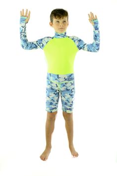 Feel stress-free this summer knowing your kids are protected from the sun! With our UPF50+ short swimsuits, your kids will have full arm, chest, and back coverage. They also feature a high collar and thumb holes so they can safely play in the sun all day long. These suits have a couple of inches of stretch to them, so you may want to size down. The size chart (in the sizing tab below) reflects measurements in inches of the flat garment (and then there are a couple of inches of stretch on top of Short Swimsuit, Yellow Camouflage, Beach Ball Games, Swim Camp, Active Swimwear, Yellow Shirt, Boys Summer Outfits, Swimming Workout, Boys Swim