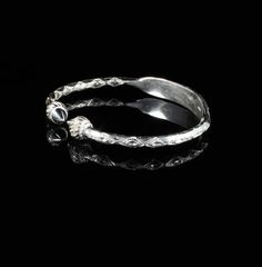 Material: .925 Sterling SilverThickness: .180" -------->About this bangle<---------This is a unique combination of the traditional West Indian Bangle with an Identification plate. The silver wire is marked with the pattern and then the plate is hammered from the middle and shaped by hand. This is a unique feature because the plate is never separate from the bangle and is less likely to break apart than some other bangles that have their plates soldered on. It does take more time and work than to Adjustable Sterling Silver Bracelet With Intricate Design For Anniversary, Sterling Silver Engraved Bangle For Anniversary, Adjustable Sterling Silver Bangle For Ceremonial Occasion, Sterling Silver Stackable Bangle For Anniversary, Sterling Silver Etched Bracelets For Anniversary, Engraved Adjustable Sterling Silver Bracelet, Heirloom Engraved Toe Ring Jewelry, Spiritual Silver Bangle For Anniversary, Ceremonial Sterling Silver Bangle Bracelets