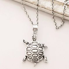 By Bhavya Jain in India, this turtle friend will be a welcome addition to your wardrobe. The delightful pendant is crafted from sterling silver, its shell treated with a combination of finishes that catches the eye. Circling the neck with cable chain, this accessory is perfect for all animal lovers. Silver Toe Rings, Turtle Necklace, Turtle Pendant, Sterling Silver Necklace Pendants, Silver Band Ring, Small Earrings, Silver Earrings Dangle, Sterling Silver Bands, Exquisite Jewelry