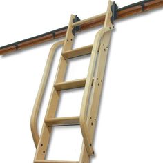 a wooden ladder is attached to the side of a wall