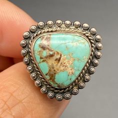 Vintage Southwestern Turquoise Sterling Silver Ring Size 6. ---------------------------------------- All items, unless stated otherwise, are previously loved and used, showing scratches and slight imperfections (not brand new). Please refer to pictures for condition as they depict what you'll receive. If you have any questions, ask before purchasing. Note:   - Size and weight are approximate.   - "Vintage" is based on look and feel; items may be older (pre-1930s) or newer (post-1980s/1990s).   - Western-style Turquoise Ring With Patina, Southwestern Style Turquoise Ring With Patina, Western Style Natural Turquoise Ring, Western Style Untreated Turquoise Ring, Untreated Western Style Turquoise Ring, Untreated Western Turquoise Ring, Southwestern Turquoise Ring With Concho, Western Style Turquoise Ring, Southwestern Turquoise Ring