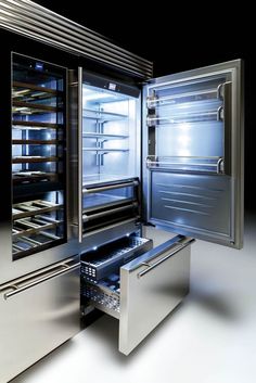 an open refrigerator with its doors wide open