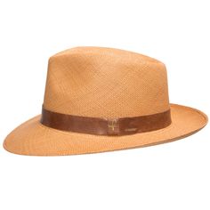 A man of mystery and undeniable style. Designed to help you keep your cool in any situation, with a padded comfort sweatband of exceptional breathability. Made of straw and is the color of toasted wheat, finely handwoven in Ecuador, and completed in the USA with a deep mocha leather hatband. Summer discoveries are waiting. Grab your hat, and get started. Material: 100% Toquilla StrawBrim: 2 3/8"Crown: 4 1/2" teardropClimate: Sun Handwoven in Ecuador. Hand-finished in the US. Measurements are app Modern Everyday Summer Hat, Casual Fitted Solid Hat Bands, Casual Solid Fitted Hat Bands, Brown Toquilla Straw Panama Hat For Outdoor, Adjustable Fit Brown Straw Hat For Outdoor, Adjustable Brown Straw Hat For Outdoor, Outdoor Adjustable Fit Brown Straw Hat, Outdoor Brown Toquilla Straw Panama Hat, Classic Woven Panama Hat For Travel