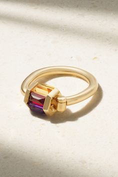 Marla Aaron's fascination with locks shines through her collections. This 'Trundle' ring is handcrafted from 18-karat gold and set with baguette-cut ruby, amethyst, sapphire and tourmaline stones - they rotate on a wheeled roller. Stack yours with other styles, or wear it as a pendant on a chunky chain. Multi Gemstone Rings, Diamond And Birthstone Rings, Luxury Ruby Baguette Cut Ring, Luxury Ruby Ring With Baguette Cut, Luxury Baguette-cut Ruby Ring In Yellow Gold, Modern Ruby Jewelry In Yellow Gold, Modern Yellow Gold Ruby Jewelry, Modern Multi-stone Baguette Cut Jewelry, Yellow Gold Jewelry With Gemstone Accents In Baguette Cut