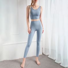 Discover the perfect sportswear for an endless stylish look with these eco-friendly women's yoga outfits. Crafted using high-quality silky nylon, this sleeveless yoga top, and high-waist pants provide day-long comfort and contribute to nature conservation. The solid pattern adds a touch of elegance, making them suitable for various sports activities. Don't wait, order now to experience the perfect blend of style and sustainability!Specifications Sport Type: Yoga Sleeve Length(cm): Sleeveless Pattern Type: Solid Origin: Mainland China Material: nylon Gender: WOMEN Fit: Fits true to size, take your normal size Feature: Anti-Pilling,Breathable,Eco-friendly,Quick Dry Department Name: Women CN: Zhejiang Brand Name: GeraldBlack When purchasing clothing, shoes, and/or belts; please follow the siz Yoga Sportswear, Women Sportswear, Yoga Outfits, Yoga Top, Hip Ups, Nature Conservation, Yoga Set, Tracksuit Women, Sports Suit