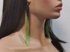 Beautiful and colorful ombre earrings. These eye-catching dangle earrings are made of  green seed beads. Silver plated ear wires. Length approximately (including ear wires) - 6.3 inches (16 cm) Ombre Earrings, Seed Beading, Earrings Beaded, Earrings Dangle, Latvia, Ear Wires, Beaded Earrings, Seed Beads, Jewelry Earrings Dangle