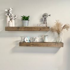 two wooden shelves with decorative items on them