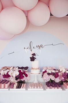 an image of a table with flowers and cake on it that says kalyna